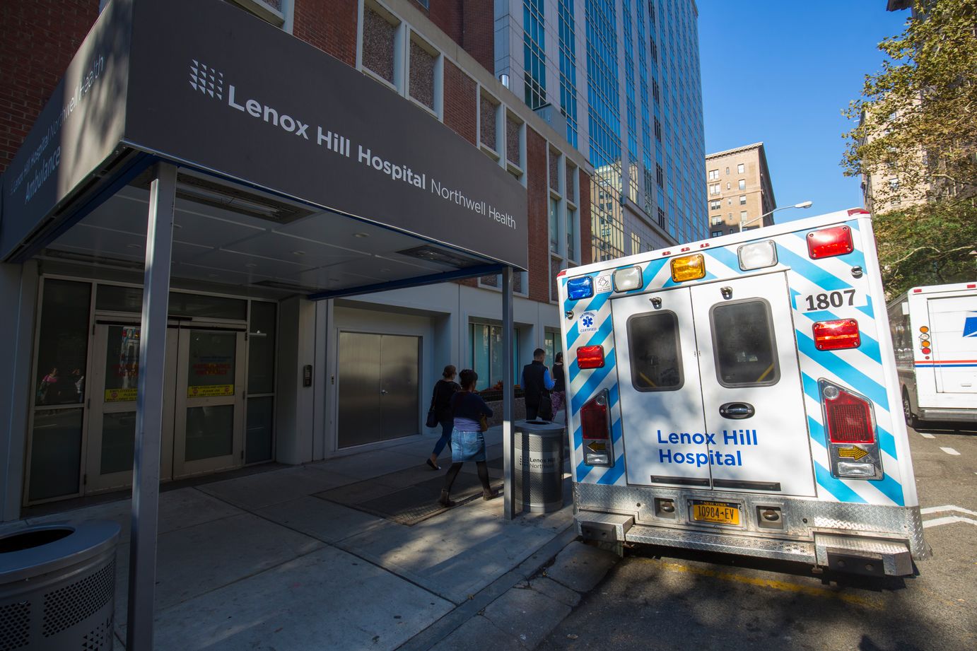 An ambulance is parked outside of Lenox Hill Hospital